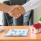 hands-of-agent-and-client-shaking-hands-after-signed-contract-buy-new-apartment-1